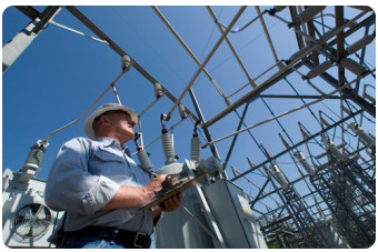 Utility worker at substation